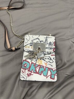 DKNYC White Graffiti Crossbody Bag with Teal and Red Accents